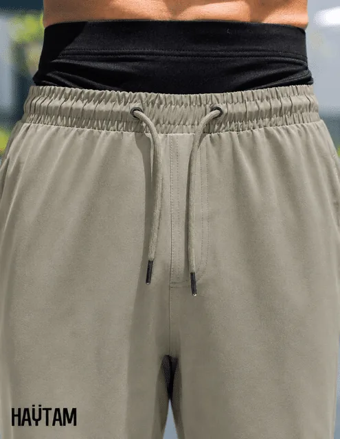 Détail de la taille élastique et du cordon du sarouel de bain Haytam gris kaki
